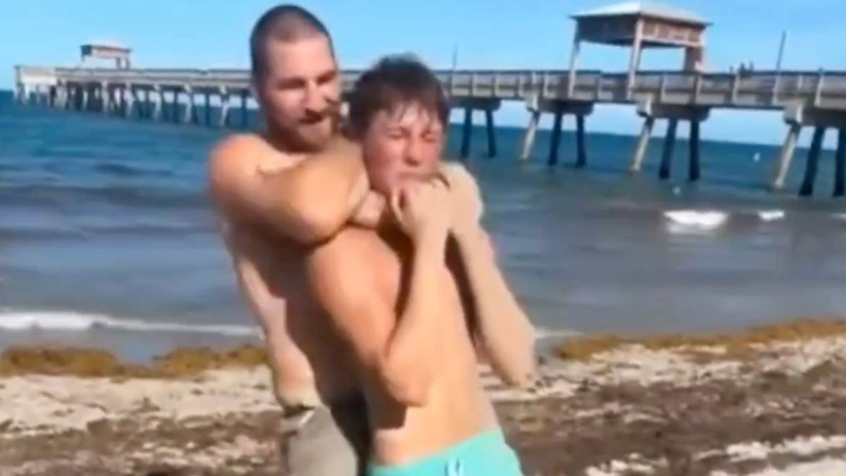 UFC champ Sean Strickland chokes fan at the beach