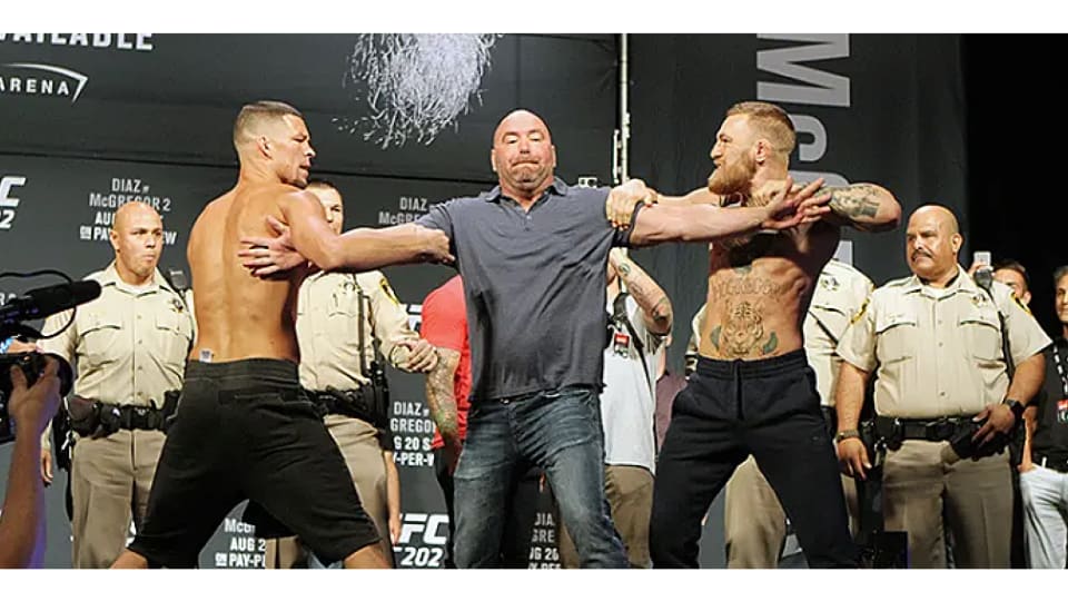 Nate Diaz and Conor McGregor at the UFC 202 Weigh-In
